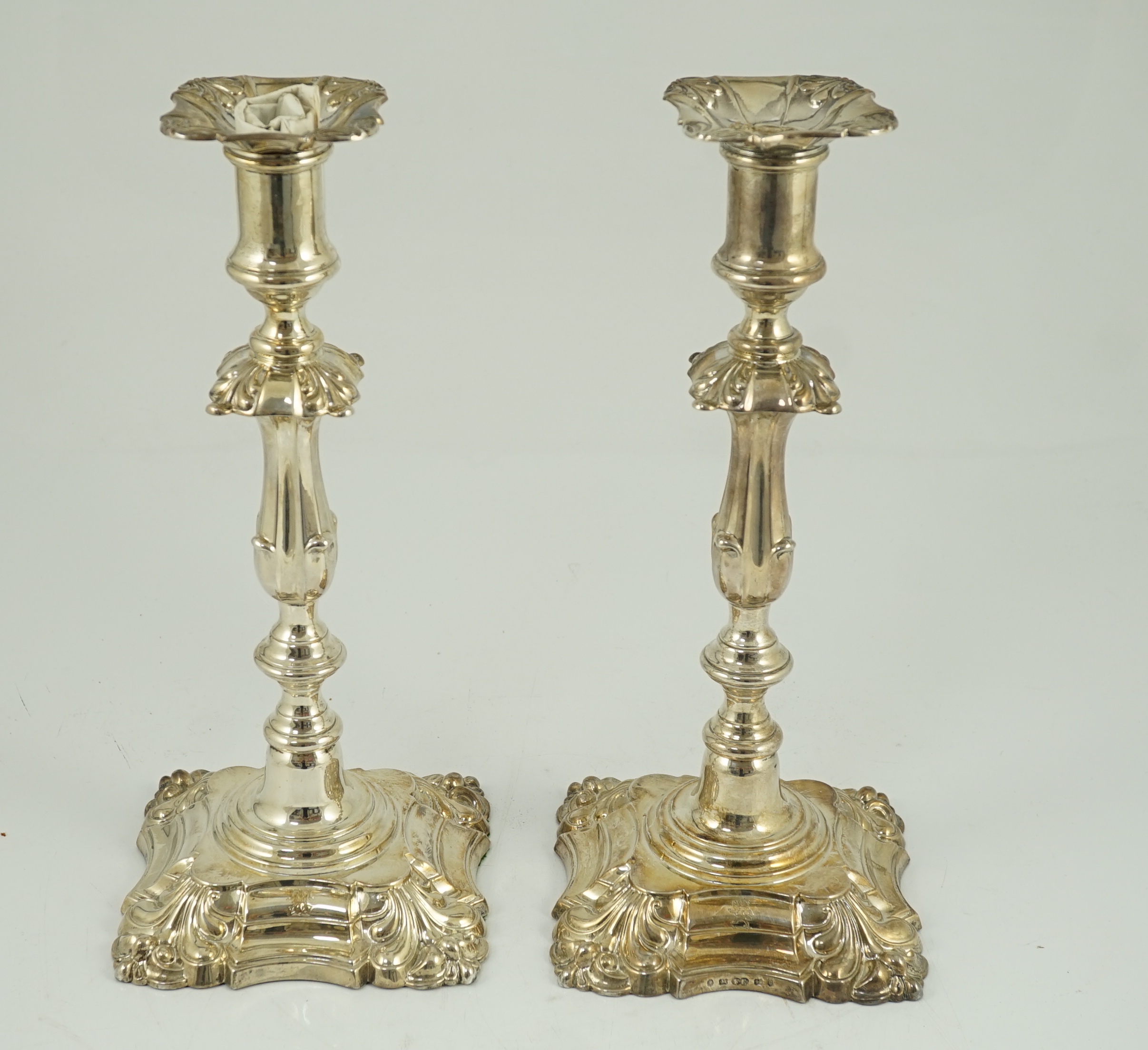 A pair of Victorian silver mounted candlesticks, by Frederick Elkington